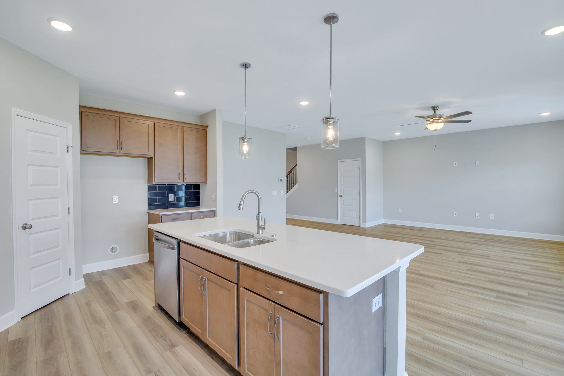 Seabrook Kitchen with Quartz Countertops and Tile Backsplash