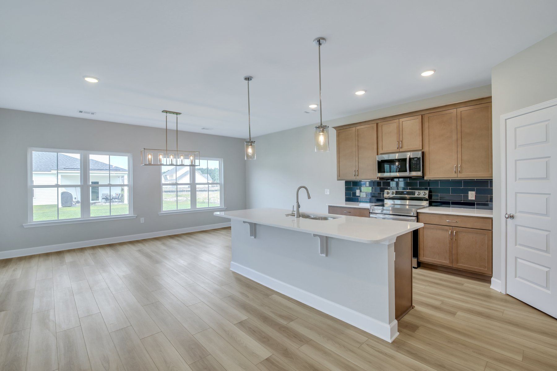 Seabrook - Family Room view to Kitchen and Morning Room | Ernest Homes