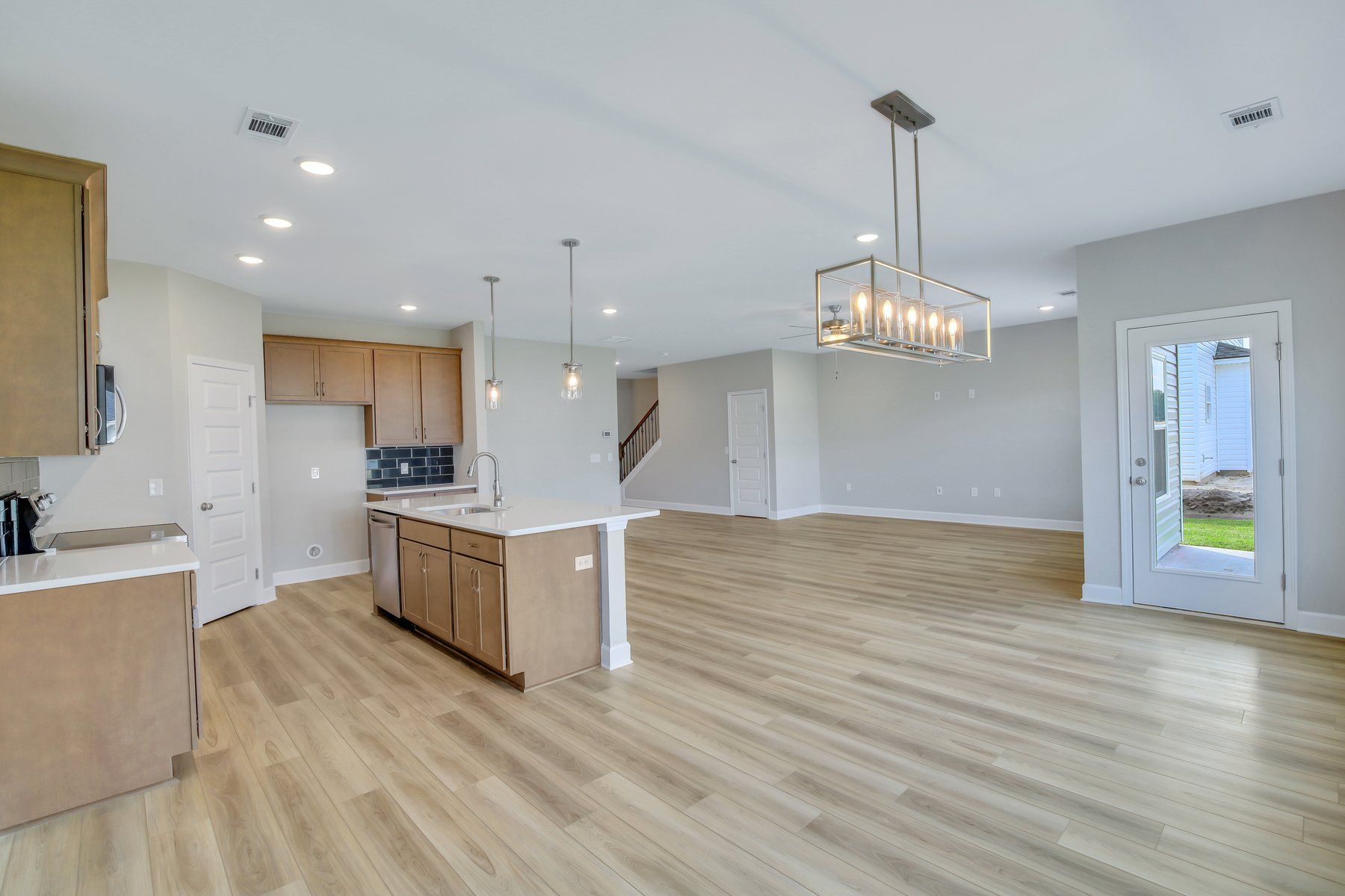 Seabrook - Morning Room view to Kitchen and Family Room | Ernest Homes