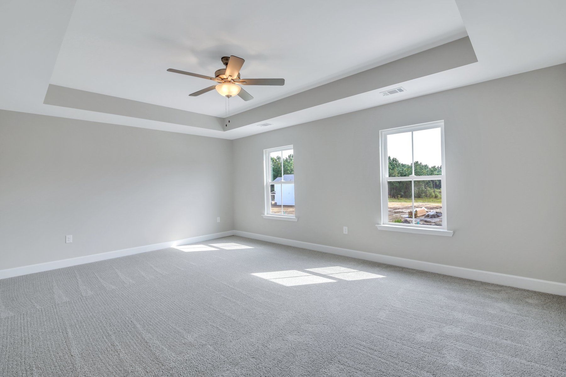 Seabrook Owner's Suite with Tray Ceiling and Large Windows