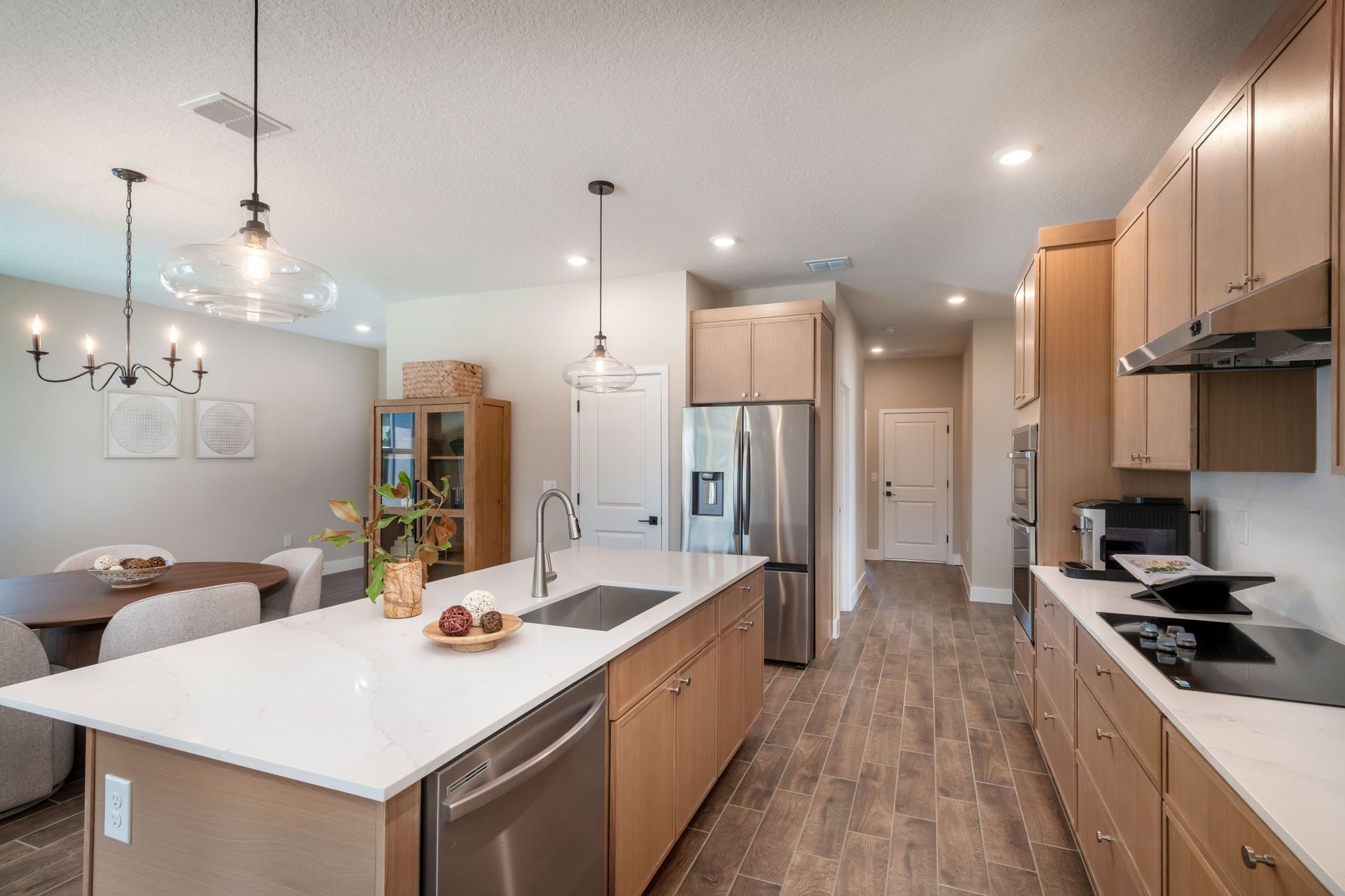 A beautifully designed kitchen with sleek cabinetry, elegant fixtures, and an inviting layout crafted for cooking, gathering, and connection.