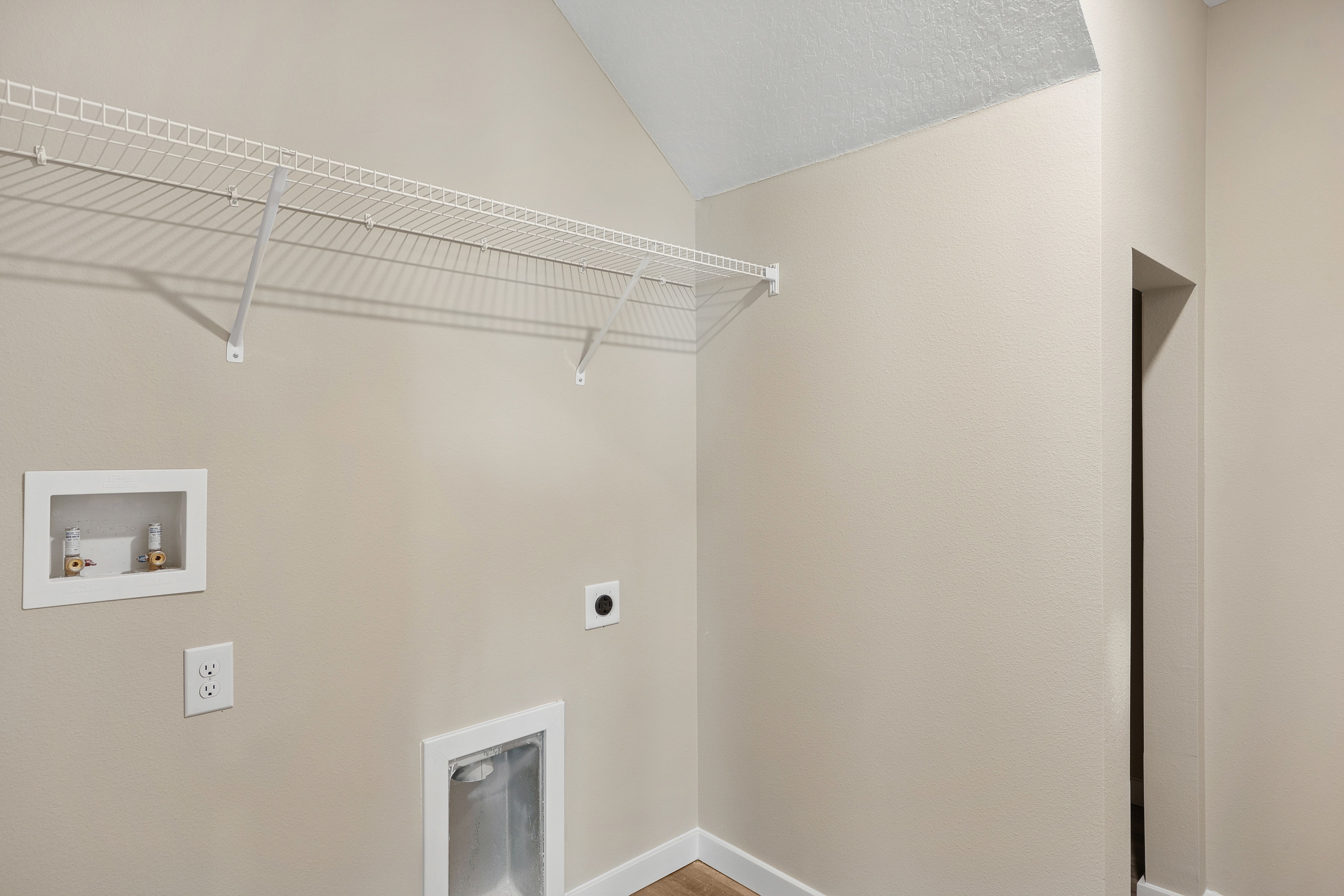 Laundry room with storage