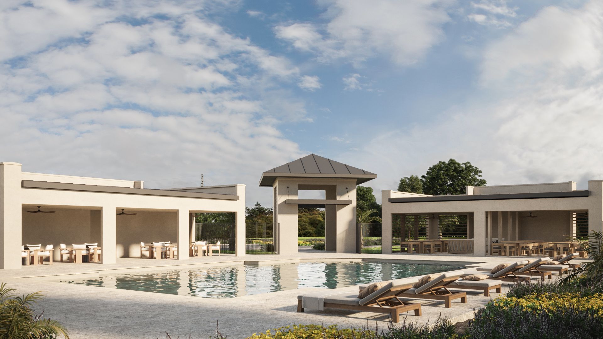 A serene, resort-inspired pool area complete with shaded lounges, open-air seating, and beautifully designed architecture, offering a relaxing retreat steps from home.