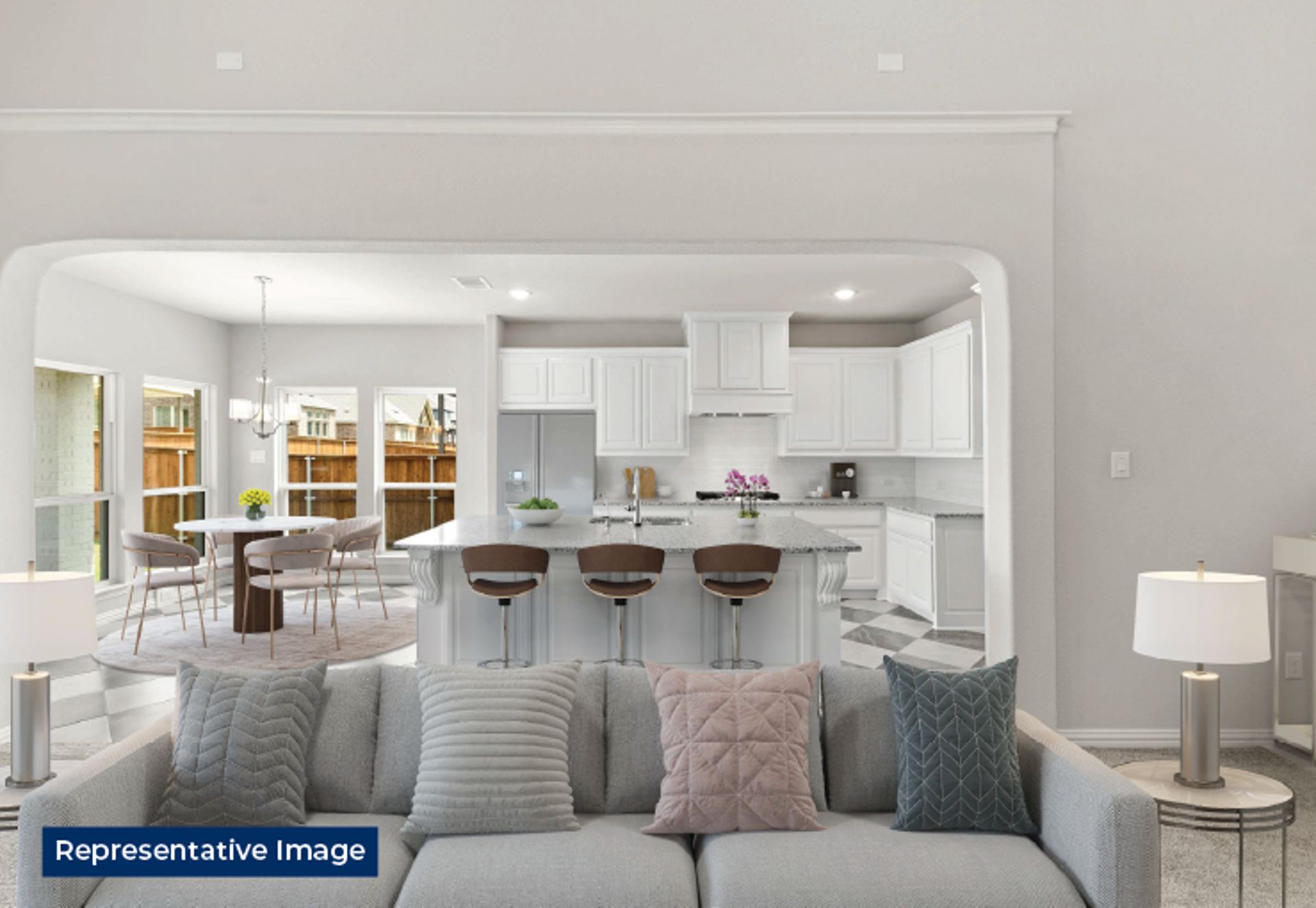 Representative photo of a modern kitchen with white cabinets and breakfast bar.