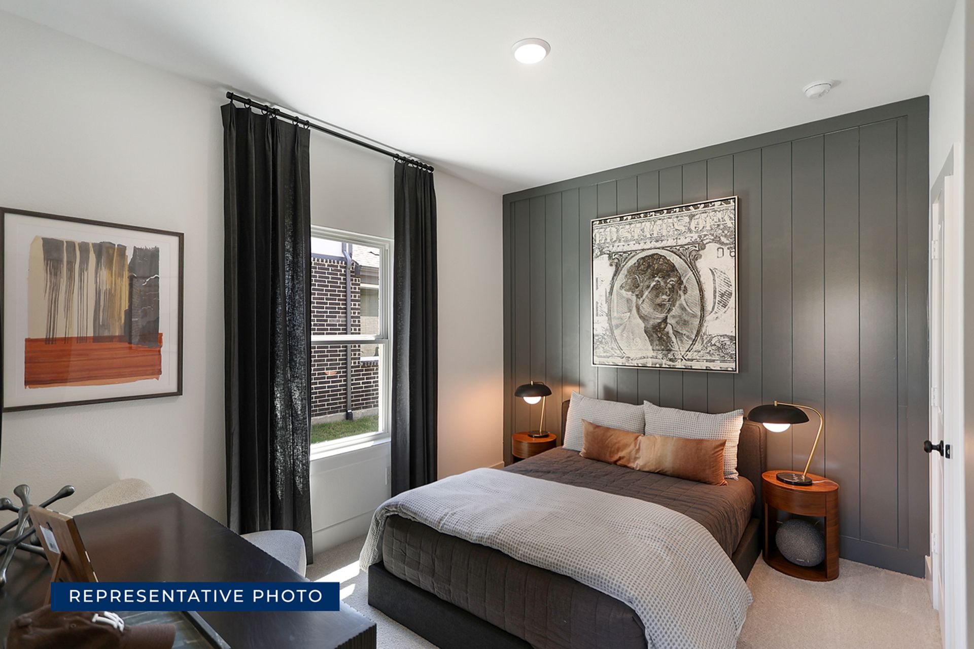 Representative photo of modern bedroom with dark accent wall and stylish decor.