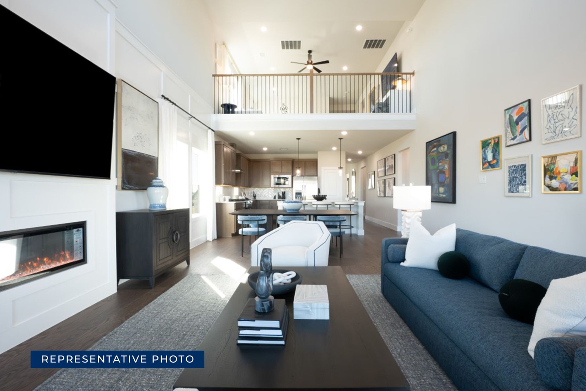 Spacious modern living room with high ceilings and stylish decor.