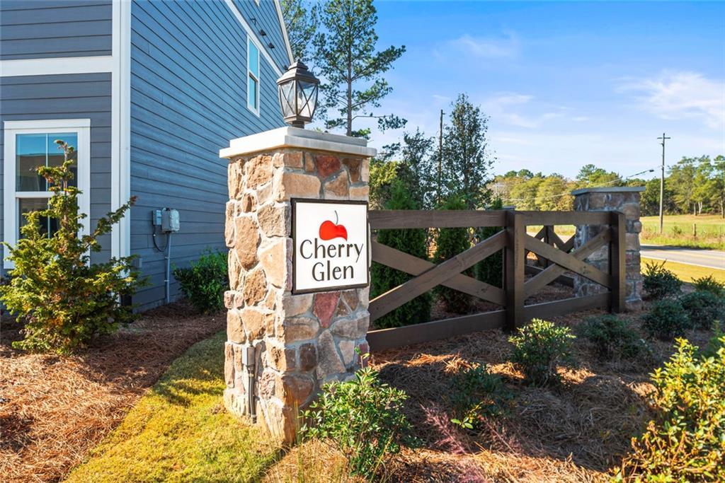 Newly developed community featuring paved roads, established homes, and undeveloped lots