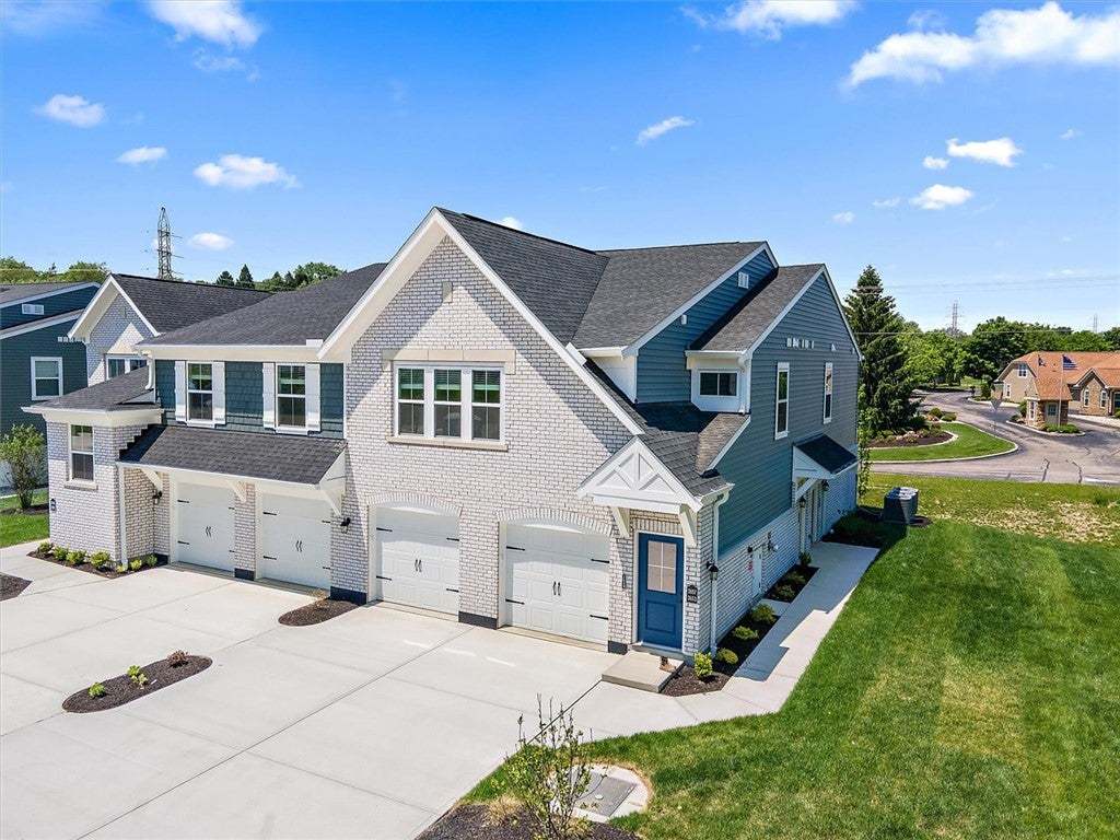 This modern townhome boasts a well-maintained exte