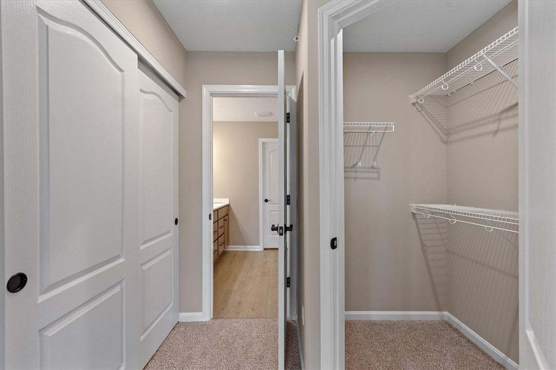 This interior hallway features closet storage with