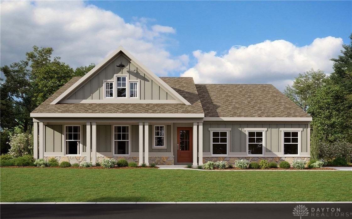 A welcoming craftsman home showcases a charming fr