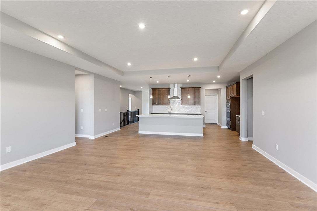 An open-concept living space with a kitchen island
