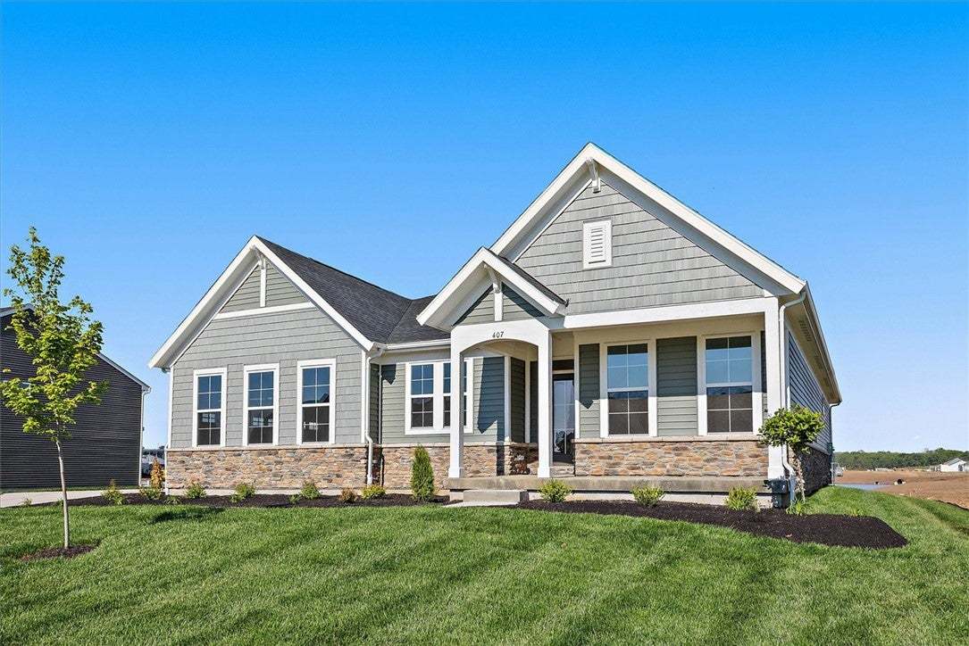 This newly constructed residence showcases an attr
