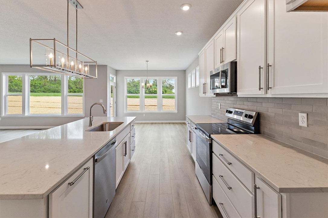 This bright kitchen features ample counter space a
