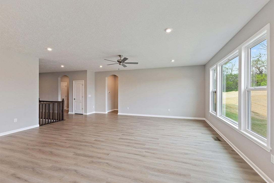 This expansive living area features luminous floor