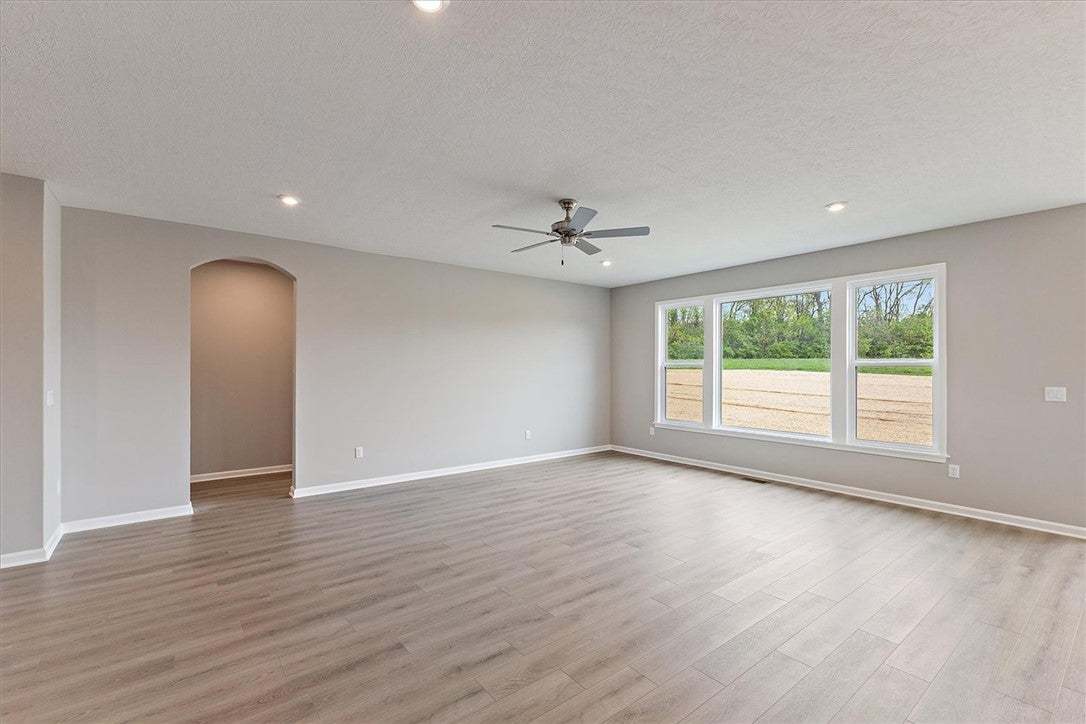 This expansive room features beautiful flooring an