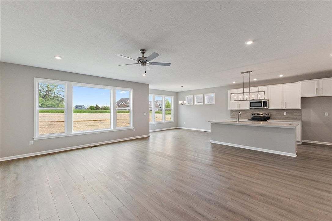 Bright, open-concept living space features expansi