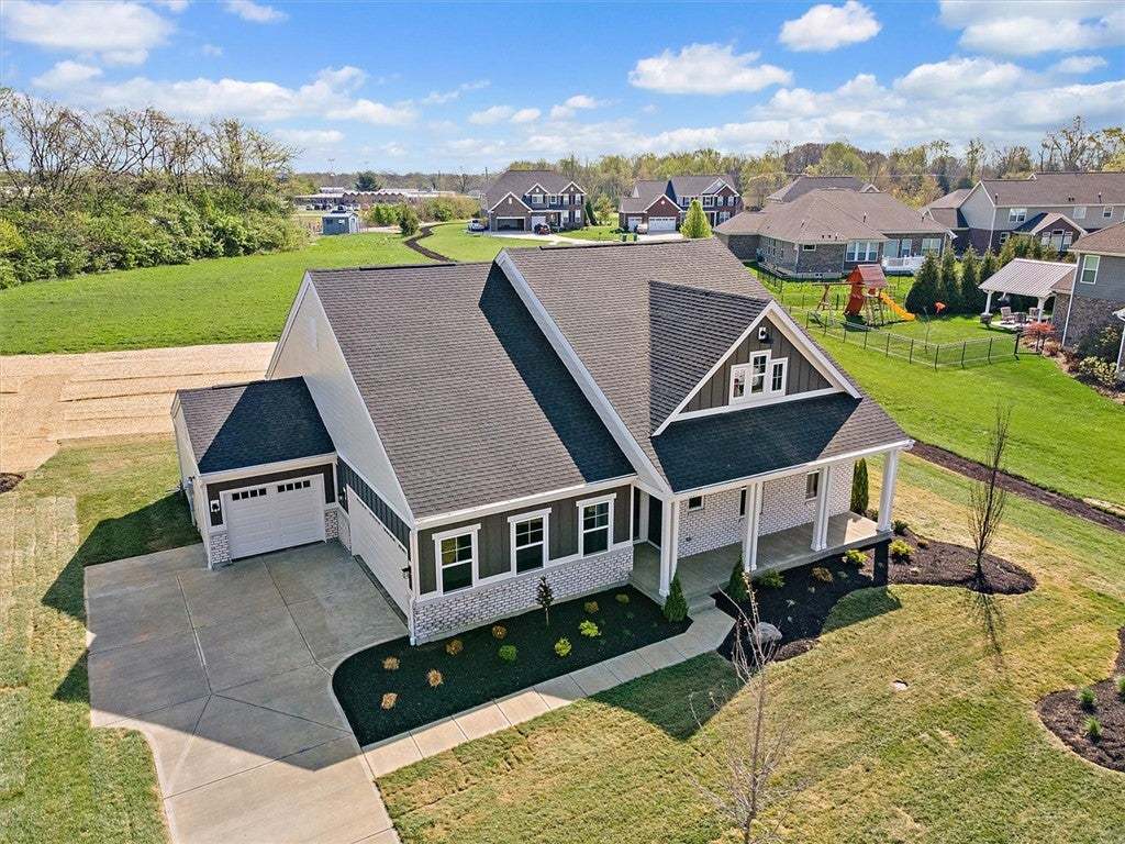 This newly constructed home features a spacious dr