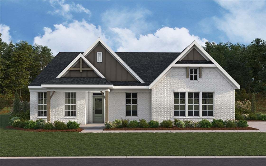 This charming home features a classic brick exteri