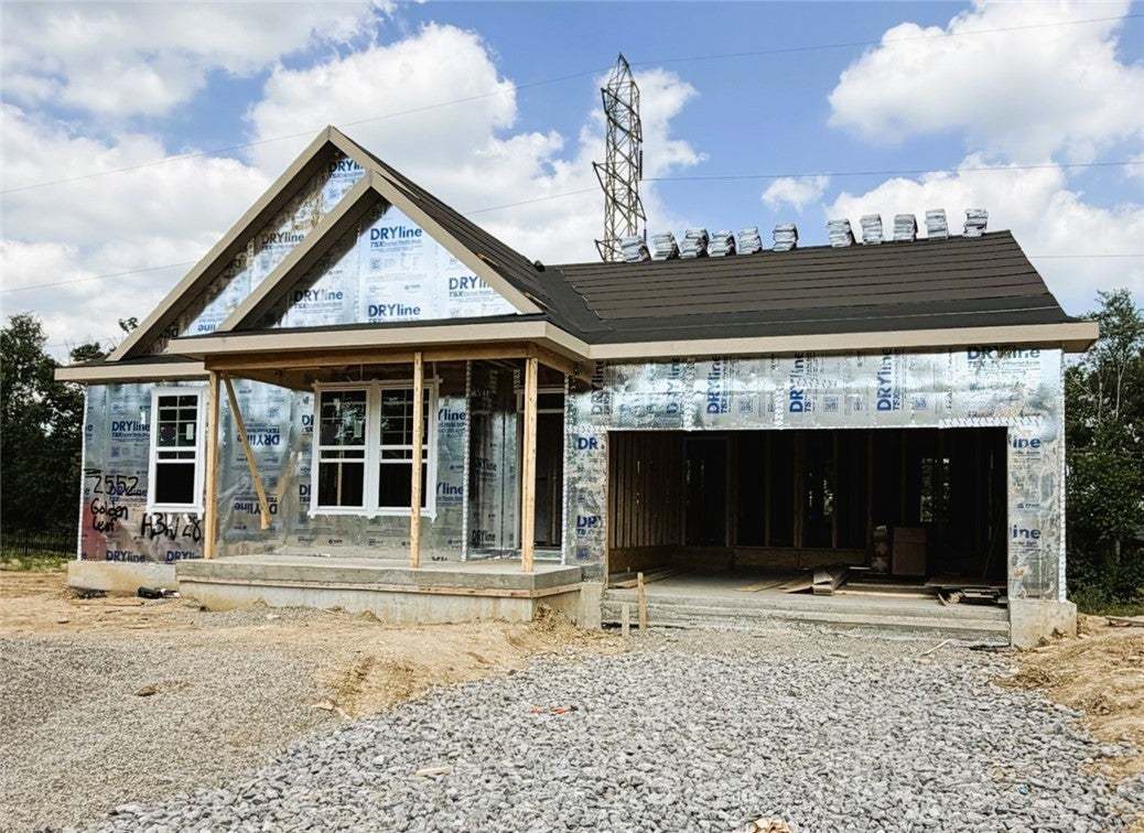 A newly constructed residence in progress, offerin