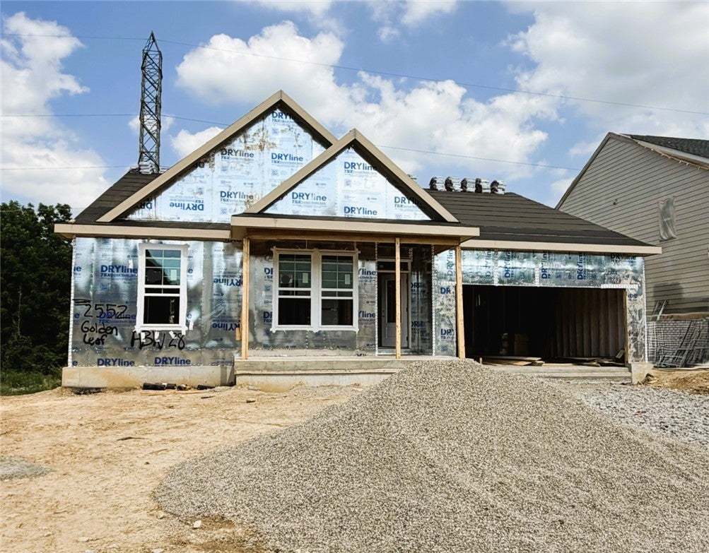 A new construction home with modern roofing and an