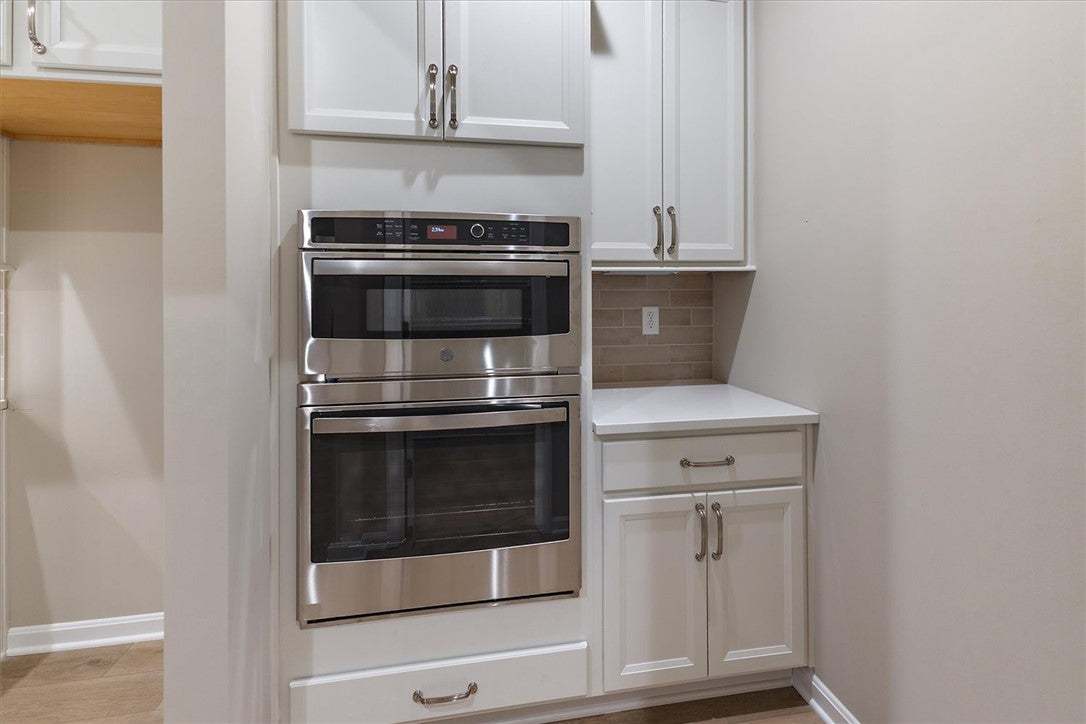A built-in double oven and sleek cabinetry maximiz