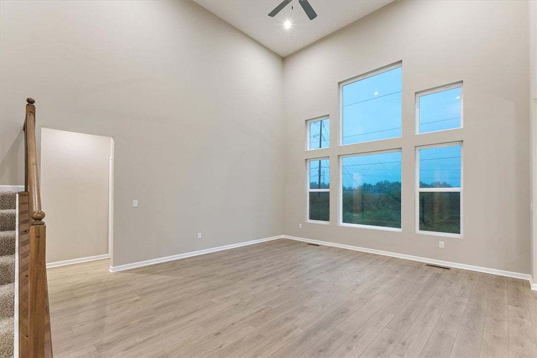 Towering windows frame tranquil outdoor views, ill