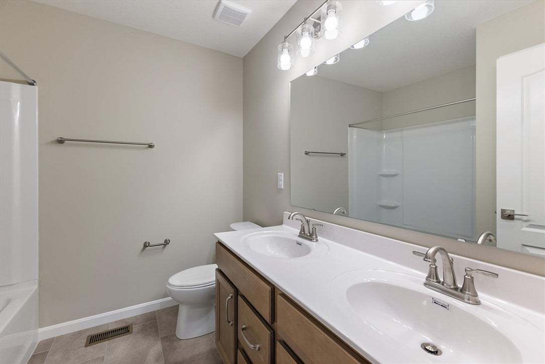 Double sinks and a large mirror highlight this mod
