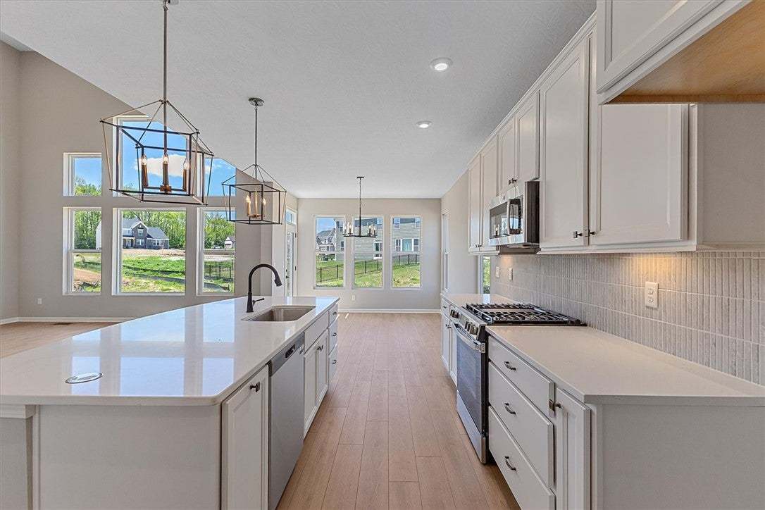 This spacious kitchen offers abundant natural ligh
