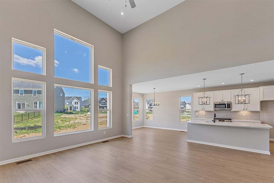This airy open-concept living space features soari