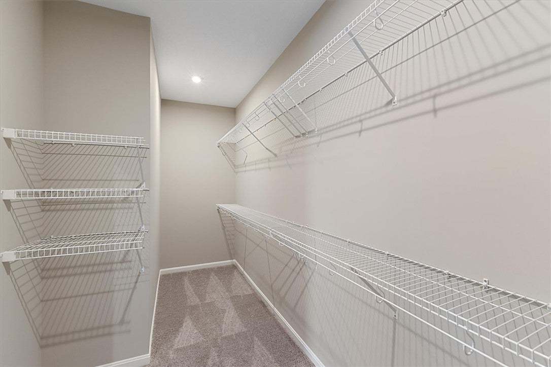 This spacious closet features ample shelving for o