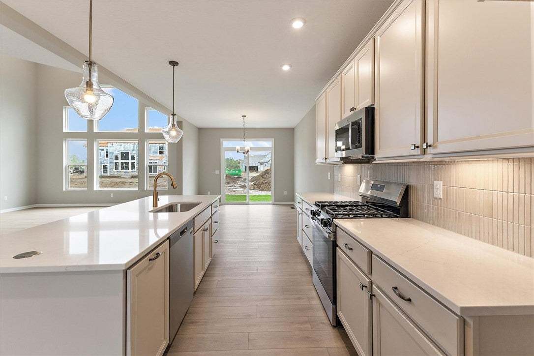 Bright and open-concept kitchen with expansive win