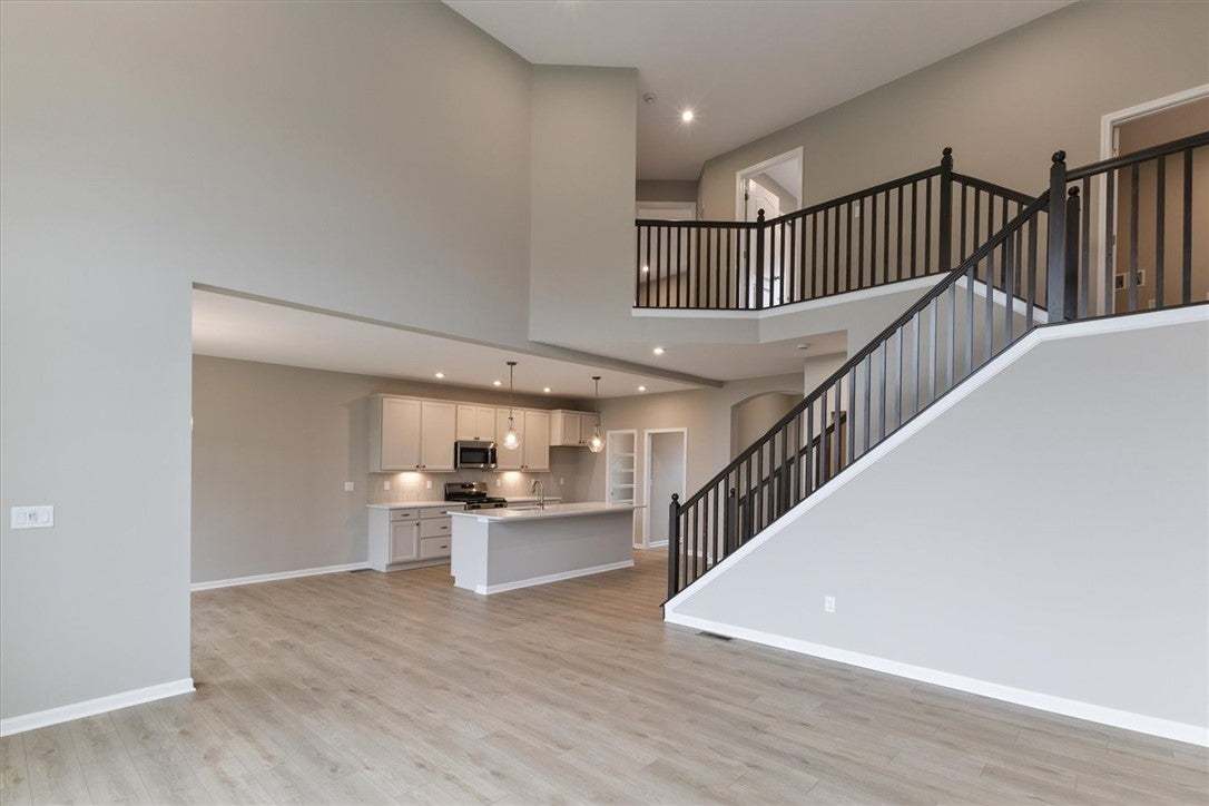 This airy open-concept interior features a well-ap