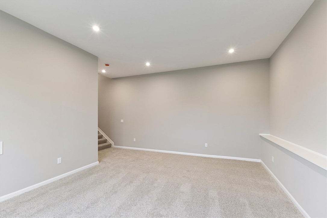 This versatile bonus room offers ample space, awai