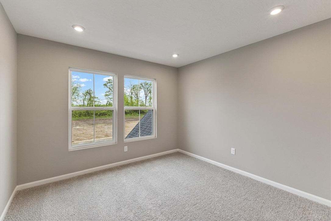 This bright room features abundant natural light a