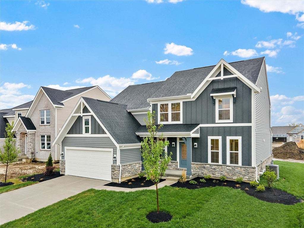 This newly constructed home boasts appealing exter