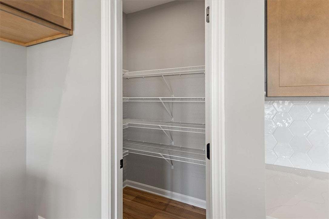 A well-organized pantry features abundant wire she