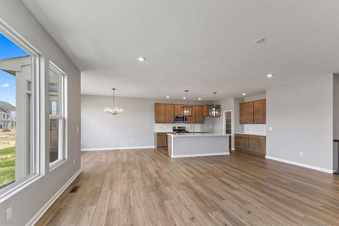 An open-concept living space integrates a well-app