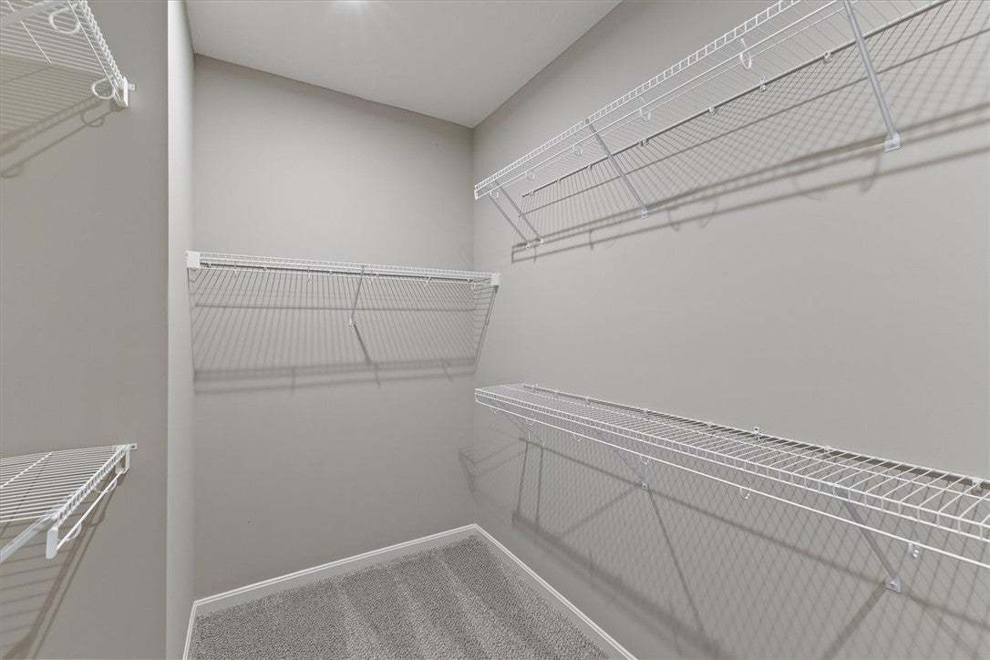 Ample wire shelving provides plentiful storage spa