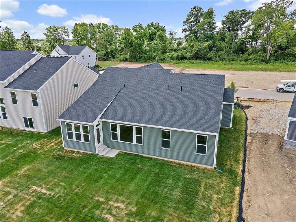 A newly constructed residence features a well-main