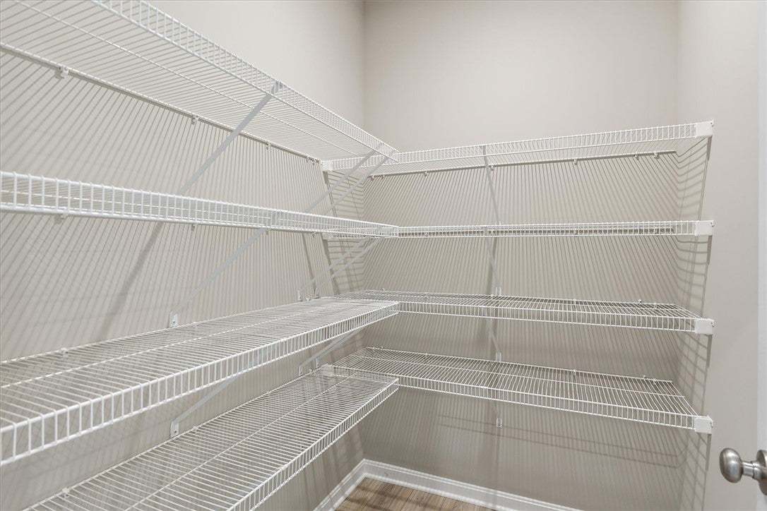 This spacious closet features ample wire shelving