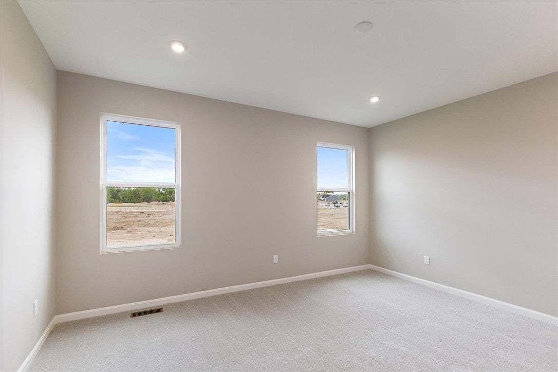 Bright and airy room with ample natural light, fea