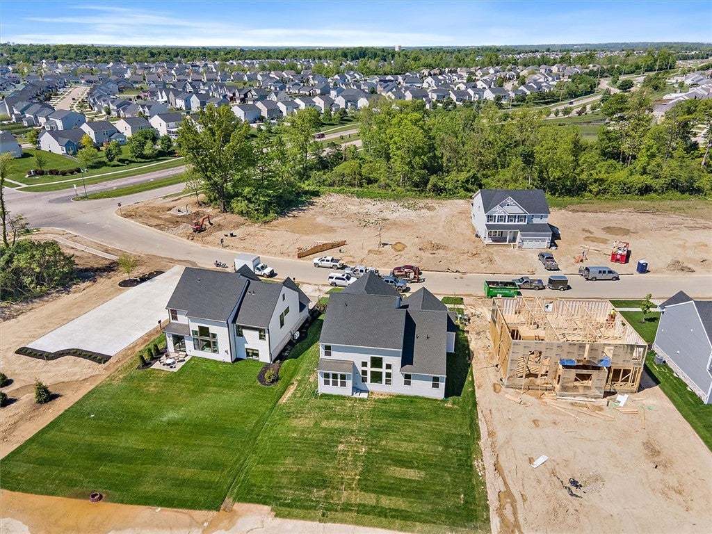 An aerial view showcases new homes under construct