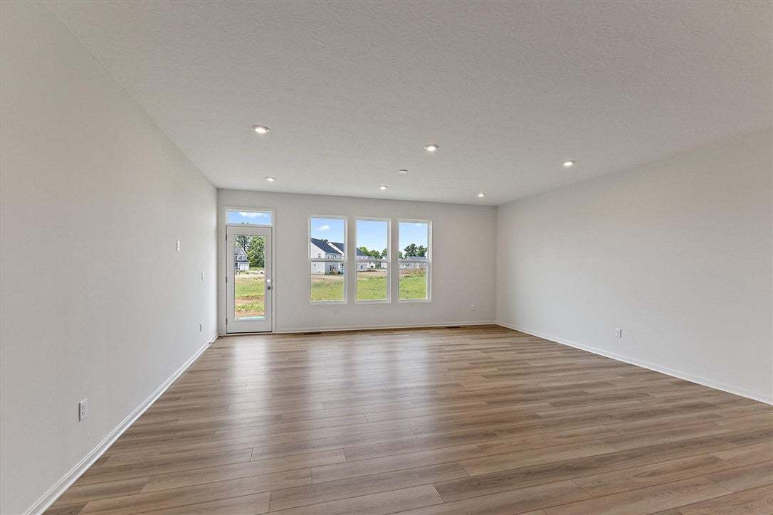 Ample natural light illuminates this open-concept