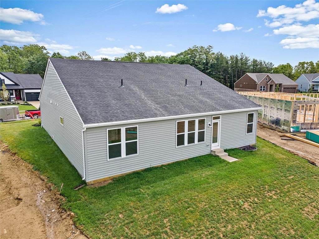 A newly constructed residence awaits, boasting a c