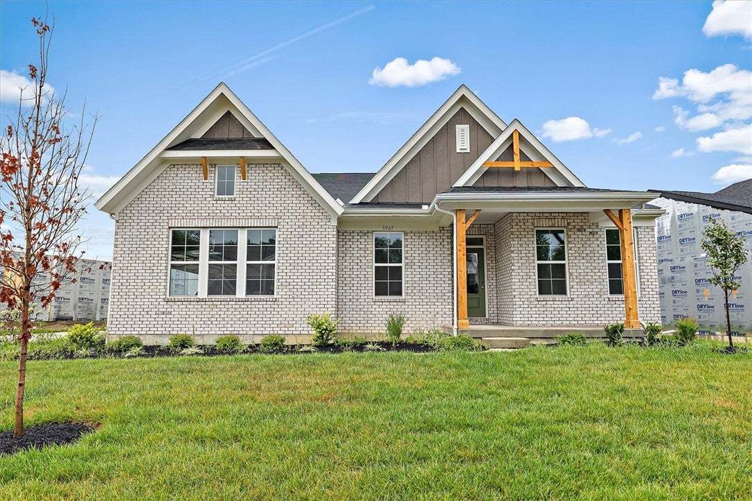 A newly constructed residence features a charming