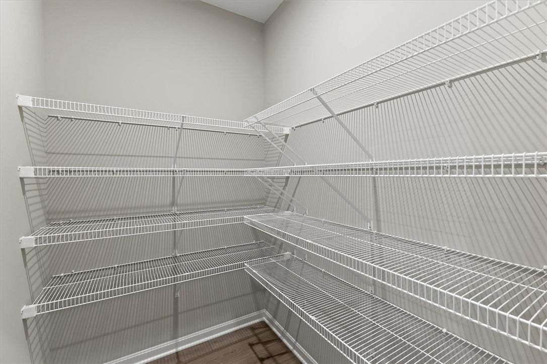 Ample wire shelving lines this functional storage