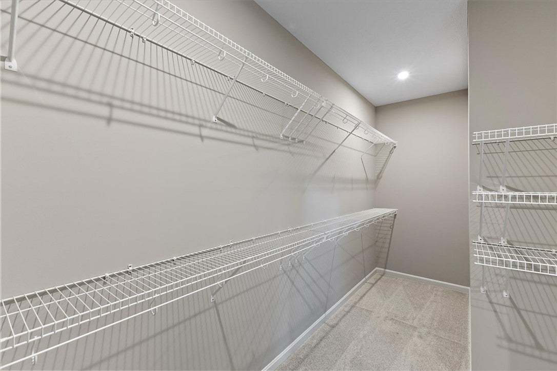 Ample wire shelving lines this functional storage
