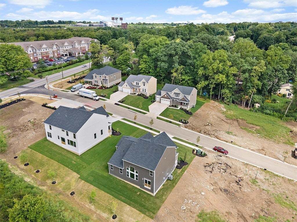 An aerial perspective showcases a developing subur