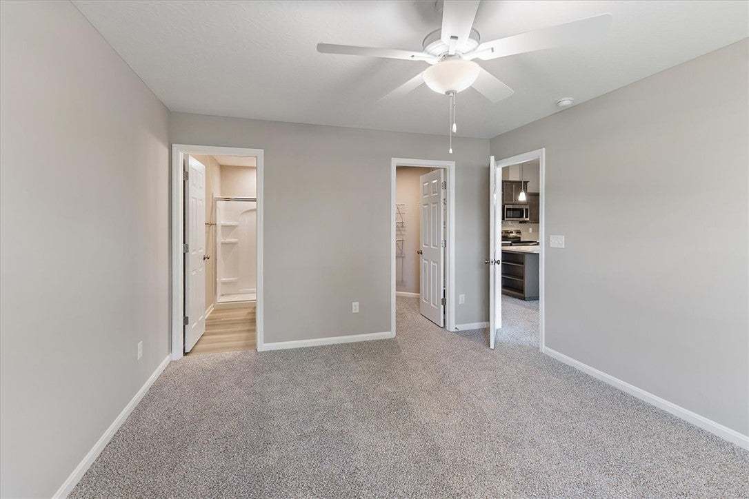 Plush carpeting and neutral tones define this vers