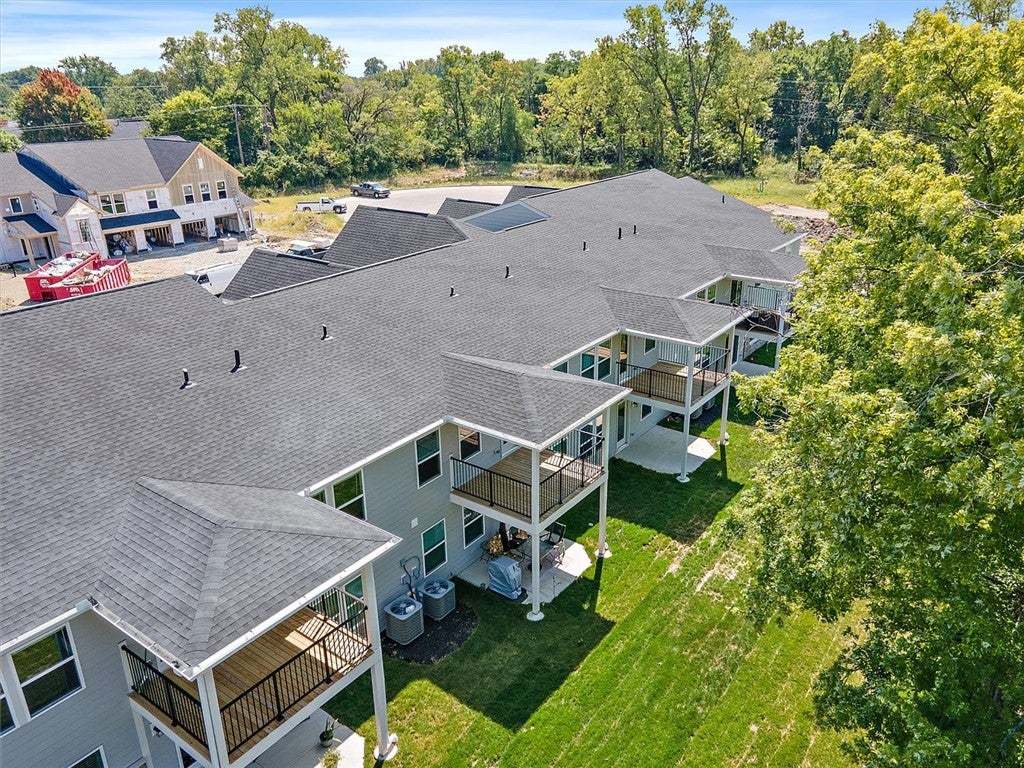 A high-angle view reveals multi-level exterior bal